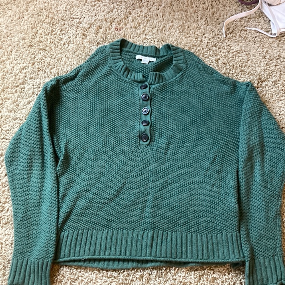 Green sweater with buttons on front